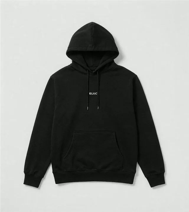 Black heavyweight hoodie laid flat against a light gray studio background